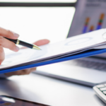 Researcher with clipboard and charts