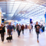 Passengers in airport blurred